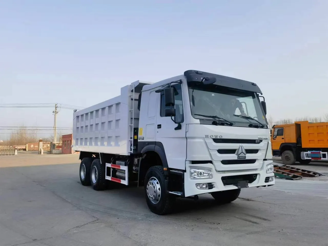 Used HOWO 6x4 tipper truck ready for export, dual rear drive axles, standard dump body