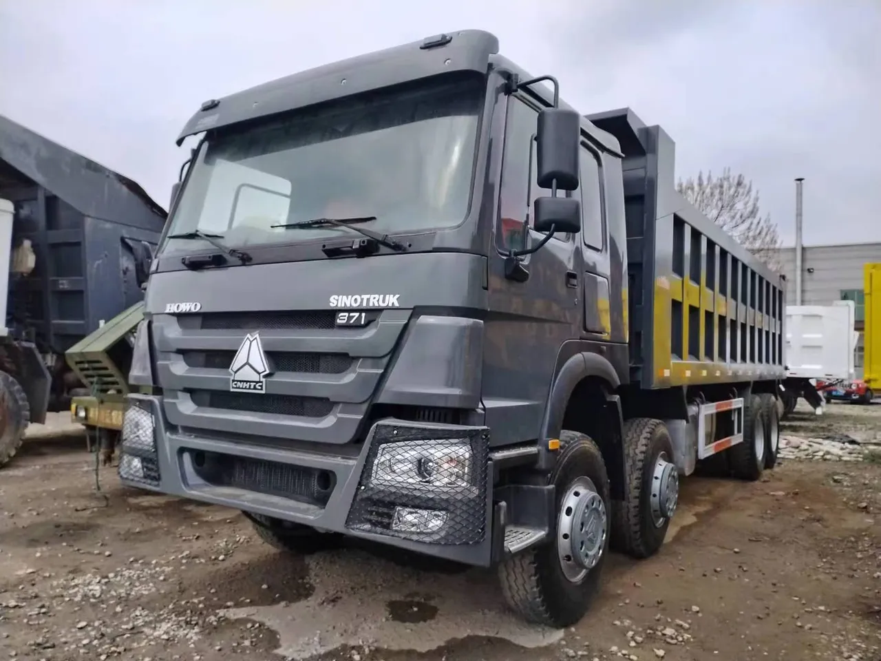 HOWO N7 8x4 dump truck with rear tipper body, right side view