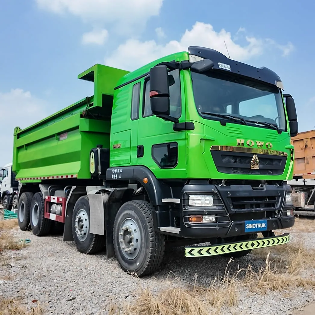 Used HOWO A7 8x4 dump truck 371HP with large tipper body for export