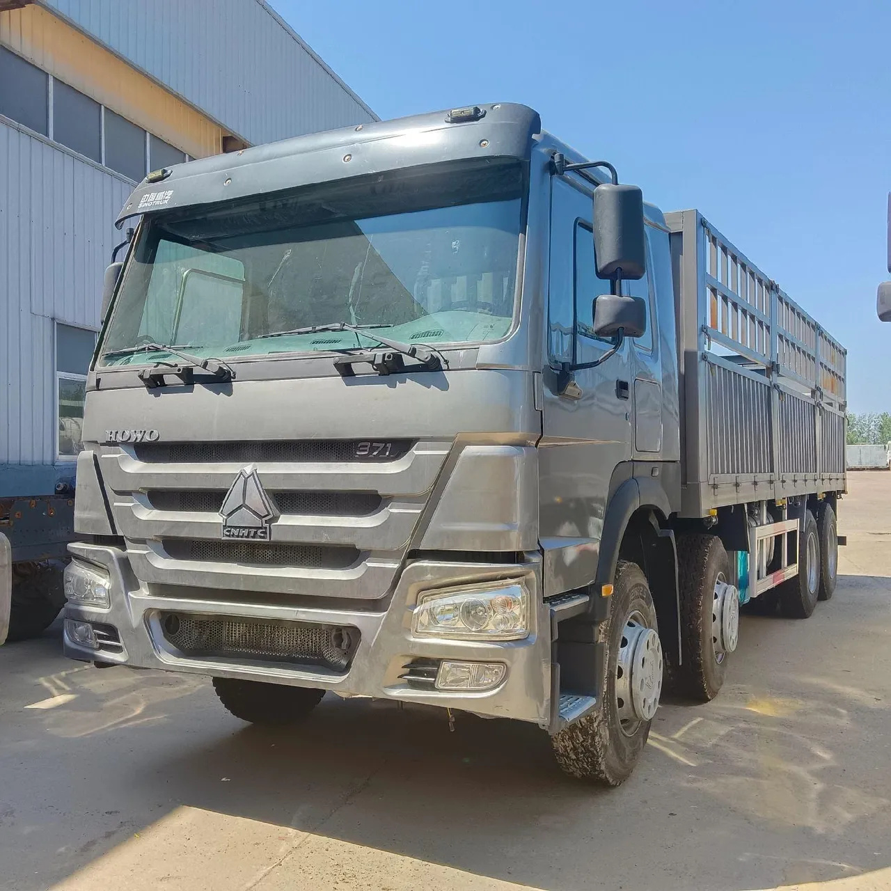 HOWO truck with WD615.47 371HP engine, inspection yard