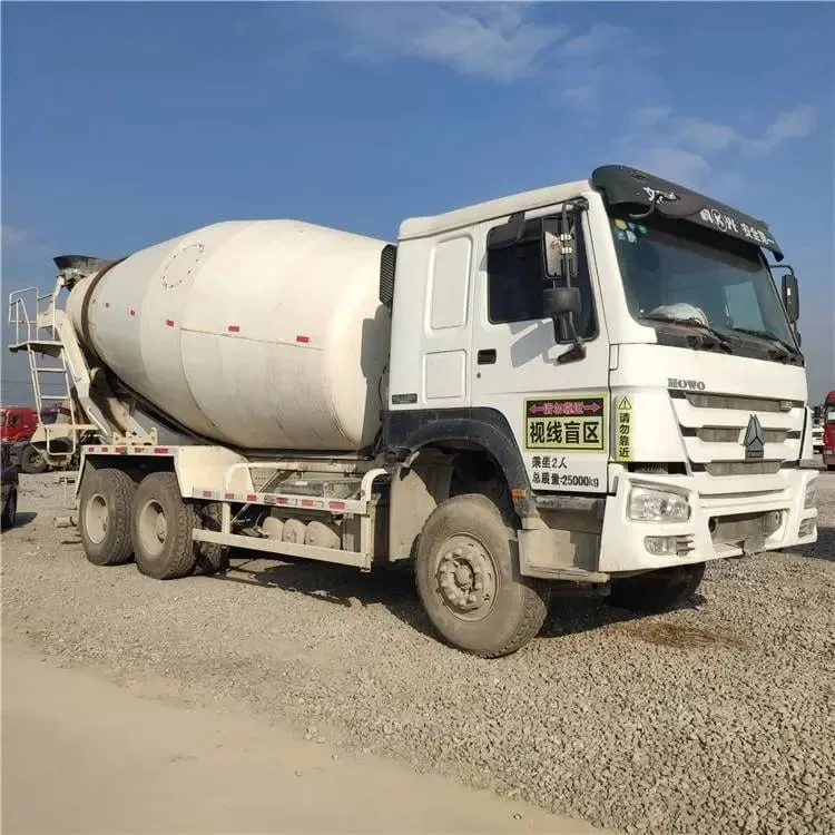 Used HOWO 6x4 concrete mixer truck ready for export, orange drum, right-hand drive conversion