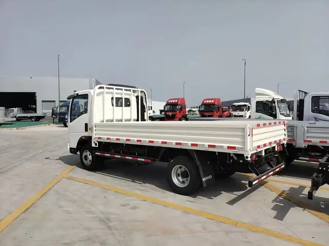 HOWO heavy cargo truck, 6x4 configuration, rear three-quarter view