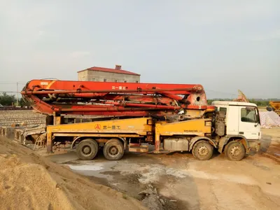 SANY red boom fully extended during outrigger load-holding test